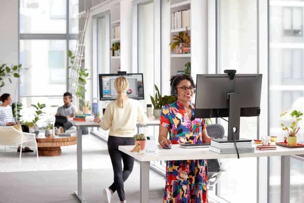 women working in an open area collaboration workplace