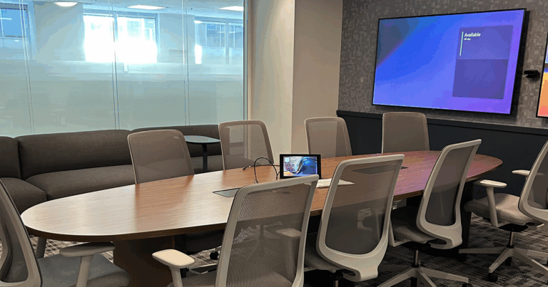 IDRC conference room featuring Microsoft Places room scheduling functionality on displays.