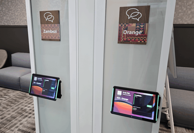 Two IDRC Teams Panels featuring Microsoft Places scheduling information. One panel is for IDRC’s Zambezi room, and the other is for the Orange room.